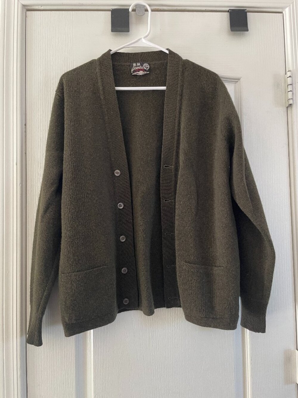 Beautiful vintage olive green cardigan by Panda, featuring a luxe camel hair and